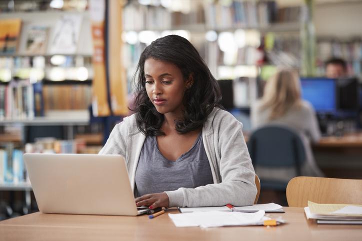 Female university student choosing a university agent