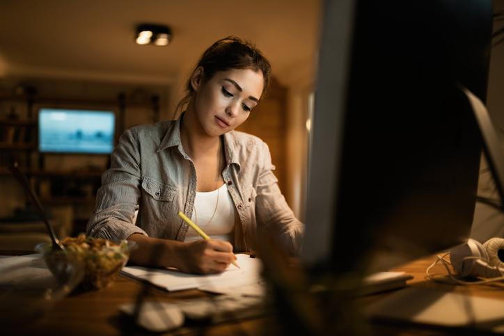Female student working at a computer