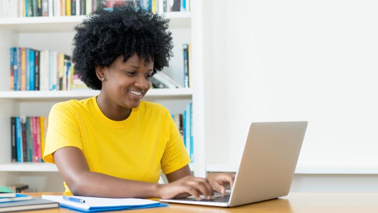 A student takes the Duolingo English Test remotely