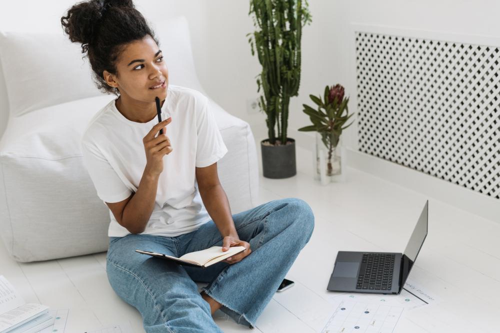 woman researching on laptop