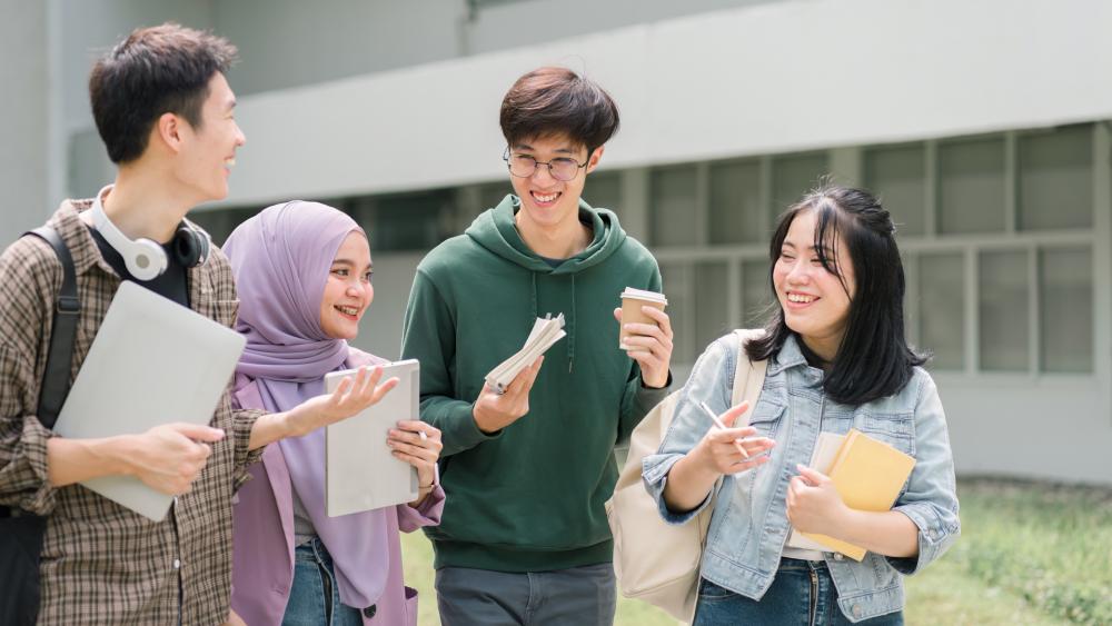 International students talking and walking together