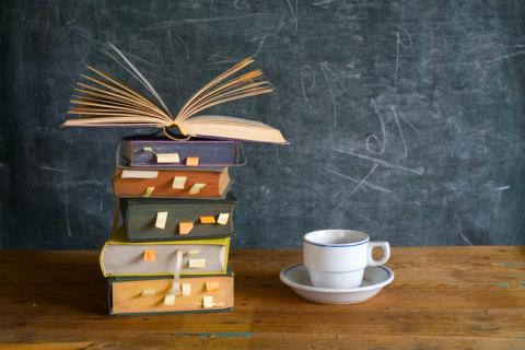 Stack of books and a cup of tea