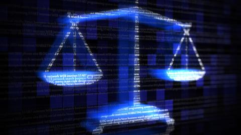 Image of the Scales of Justice created from digital code