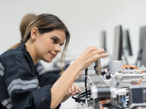 Young engineer working on a project during an internship