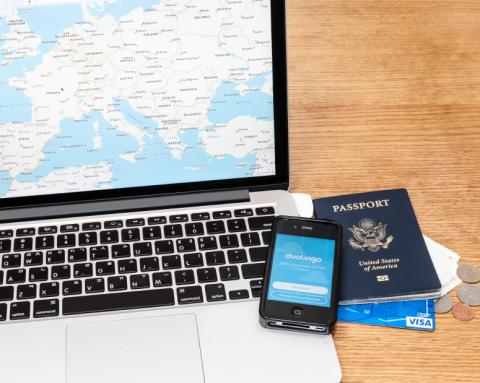 Laptop, passport, phone and credit card for travelling 