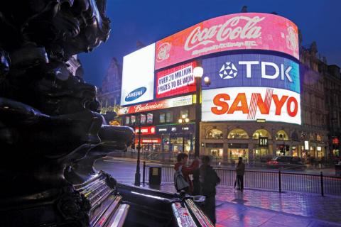 Tourists visiting Piccadilly Circus, London